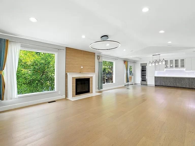 Empty room, Fireplace, Interior, Pendant Lights, Recessed Lighting, Wood Texture Flooring, Wooden Walls