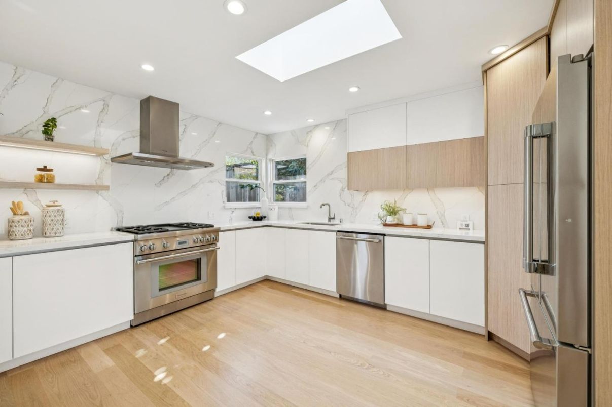 Interior, Kitchen, Marble Walls, Recessed Lighting, Stainless Steel Appliances, Wood Texture Flooring