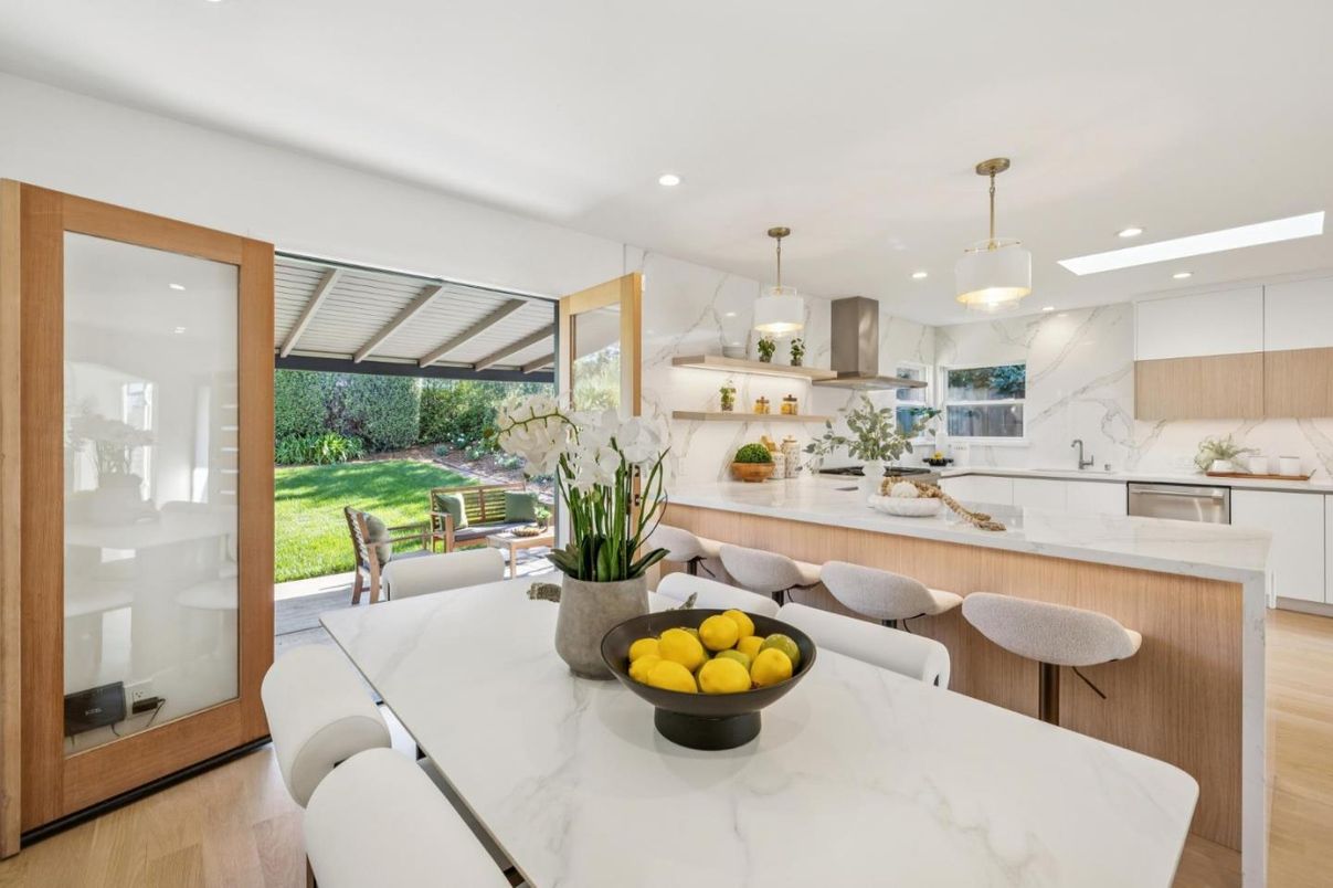 Dining room, Interior, Kitchen, Marble Walls, Pendant Lights, Recessed Lighting, Stainless Steel Appliances, Wood Texture Flooring