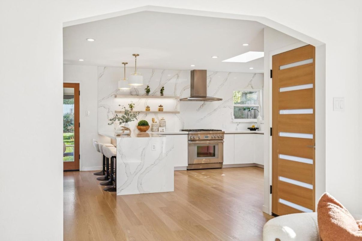 Interior, Kitchen, Marble Walls, Pendant Lights, Recessed Lighting, Stainless Steel Appliances, Wood Texture Flooring