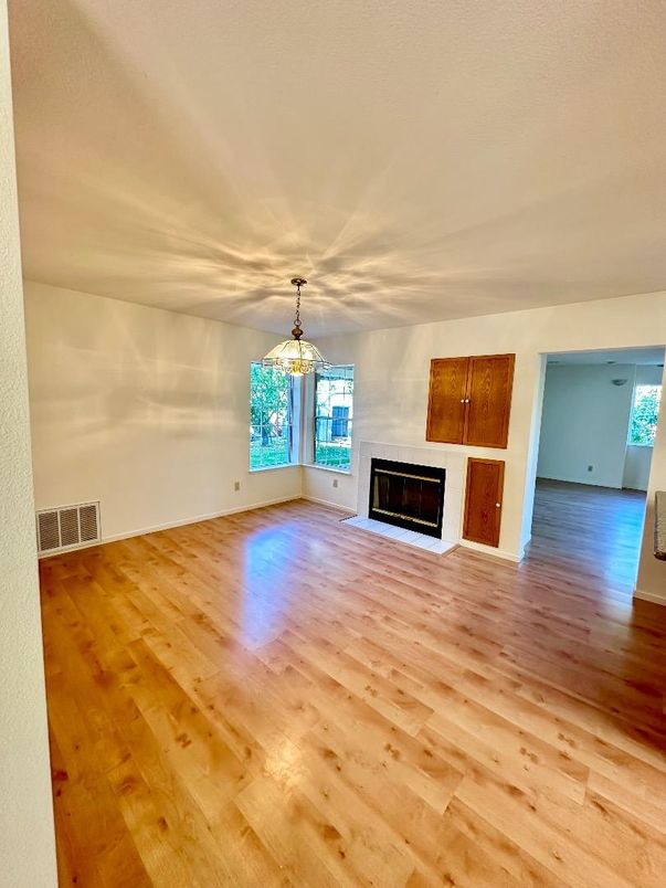 Empty room, Fireplace, Interior, Pendant Lights, Wood Texture Flooring