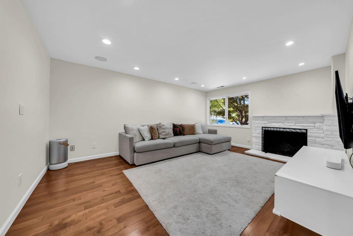 Fireplace, Interior, Living room, Recessed Lighting, Wood Texture Flooring