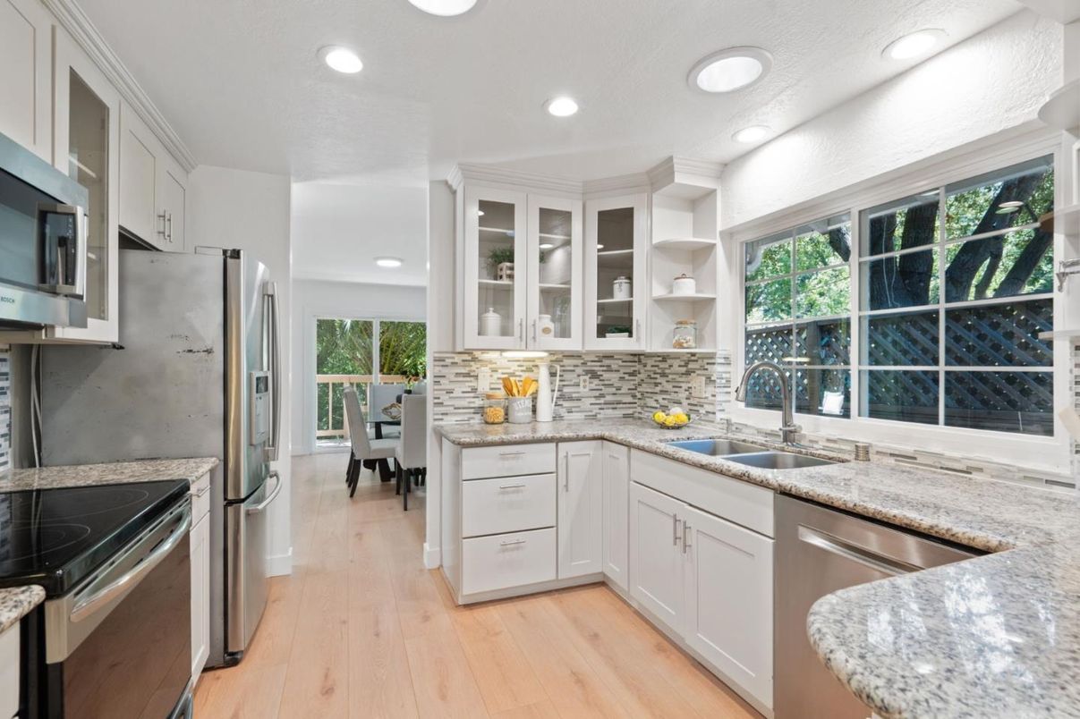Dining room, Interior, Kitchen, Recessed Lighting, Stainless Steel Appliances, Wood Texture Flooring