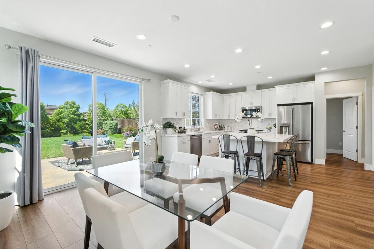 Dining room, Interior, Kitchen, Recessed Lighting, Stainless Steel Appliances, Wood Texture Flooring