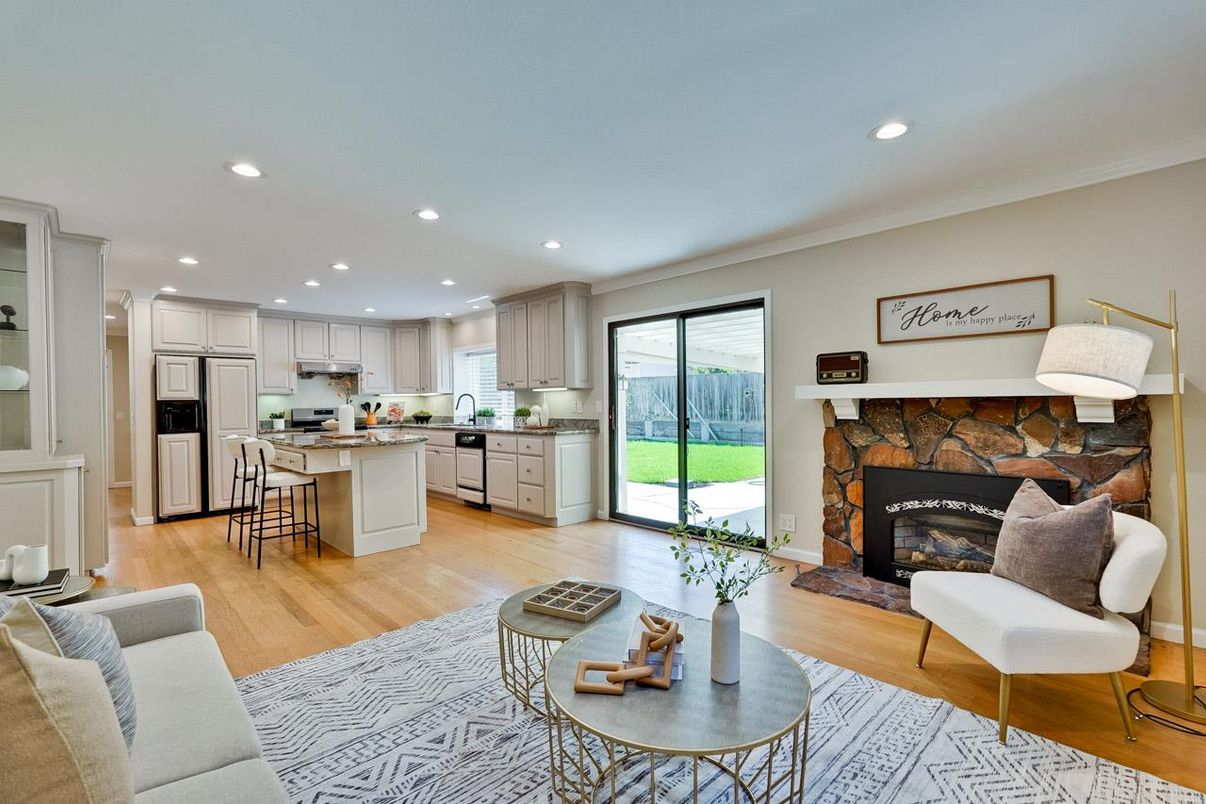 Fireplace, Interior, Kitchen, Living room, Recessed Lighting, Stainless Steel Appliances, Wood Texture Flooring