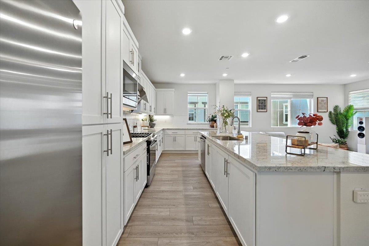 Interior, Kitchen, Recessed Lighting, Stainless Steel Appliances, Wood Texture Flooring