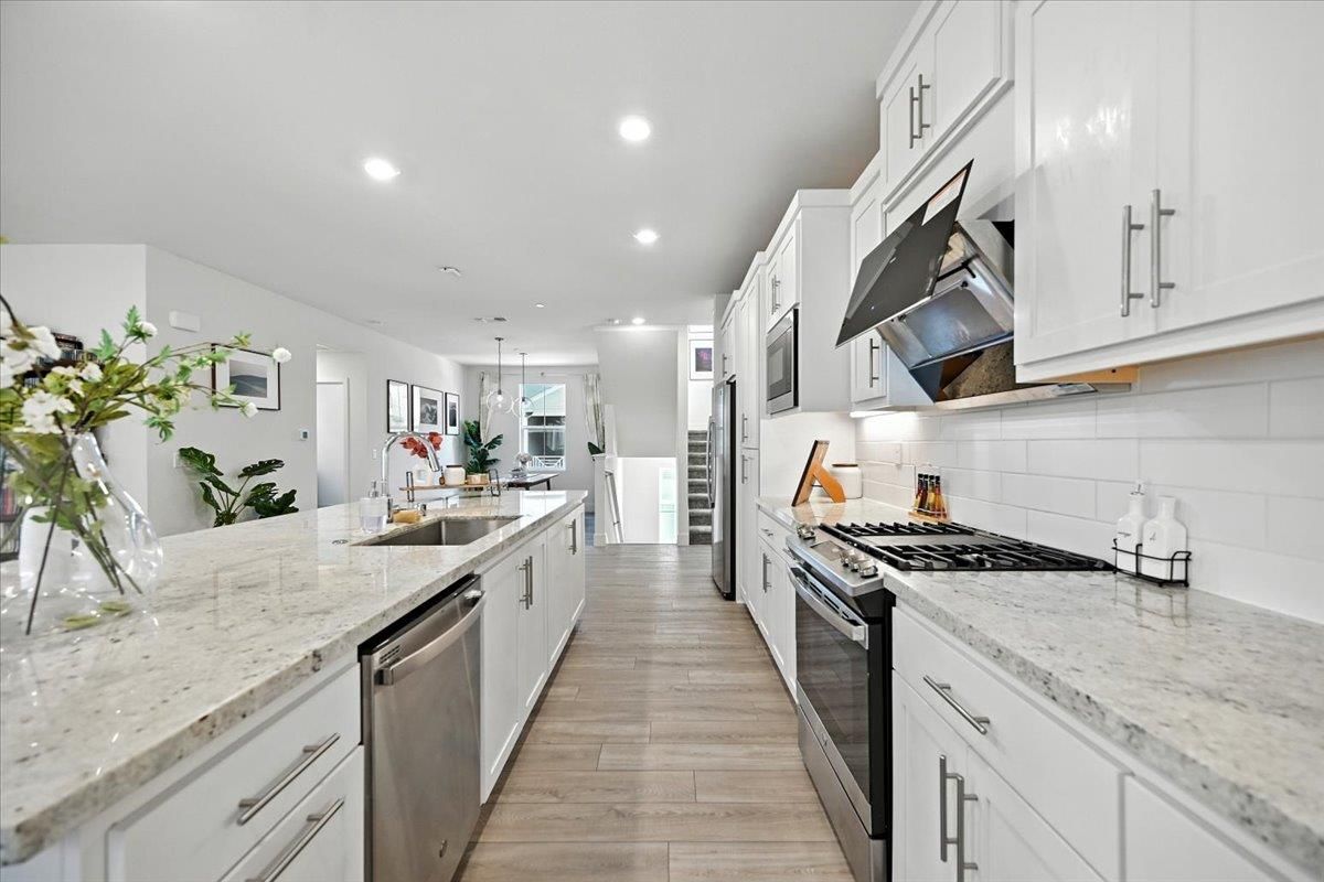 Interior, Kitchen, Pendant Lights, Recessed Lighting, Stainless Steel Appliances, Wood Texture Flooring