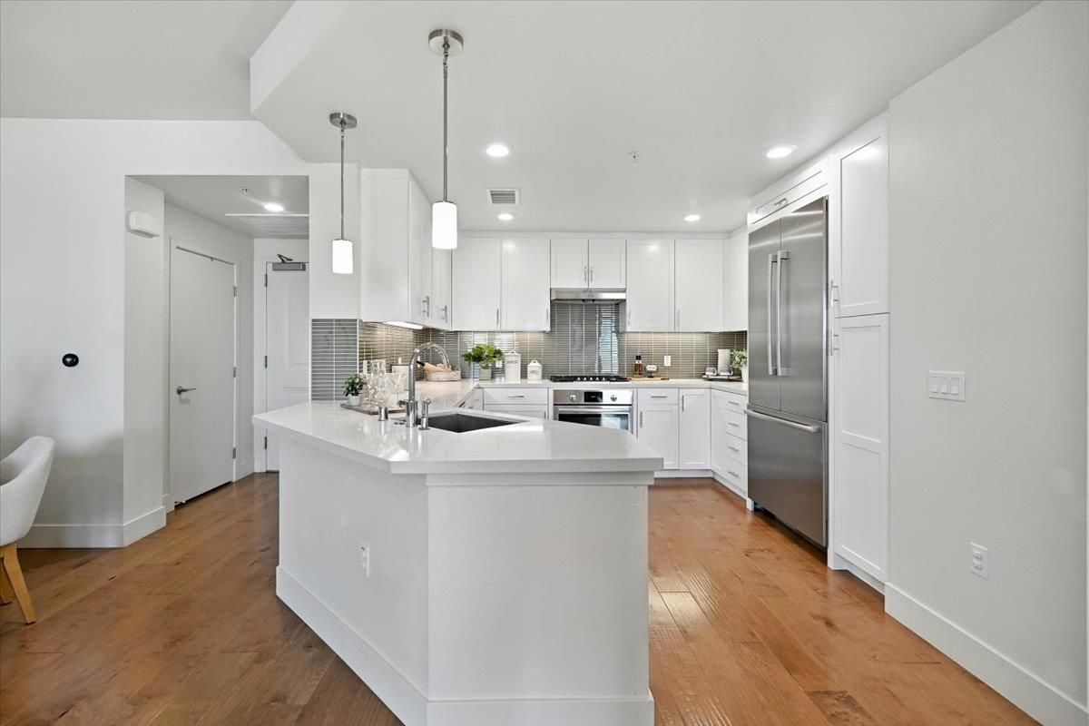 Interior, Kitchen, Pendant Lights, Recessed Lighting, Stainless Steel Appliances, Wood Texture Flooring
