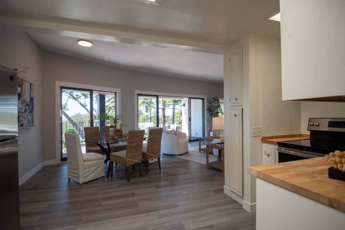 Dining room, Interior, Kitchen, Living room, Recessed Lighting, Stainless Steel Appliances, Wood Texture Flooring