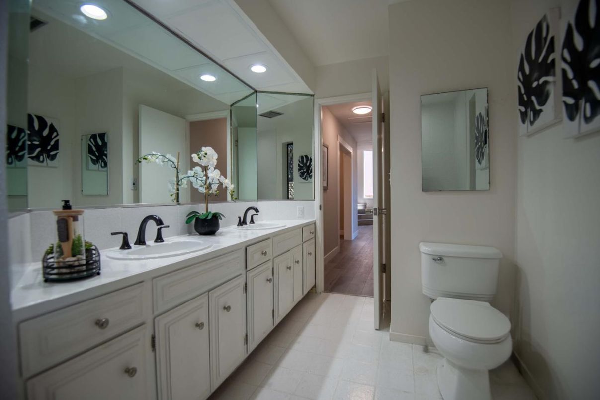 Bathroom, Dual Sink Vanities, Interior, Recessed Lighting, Wood Texture Flooring