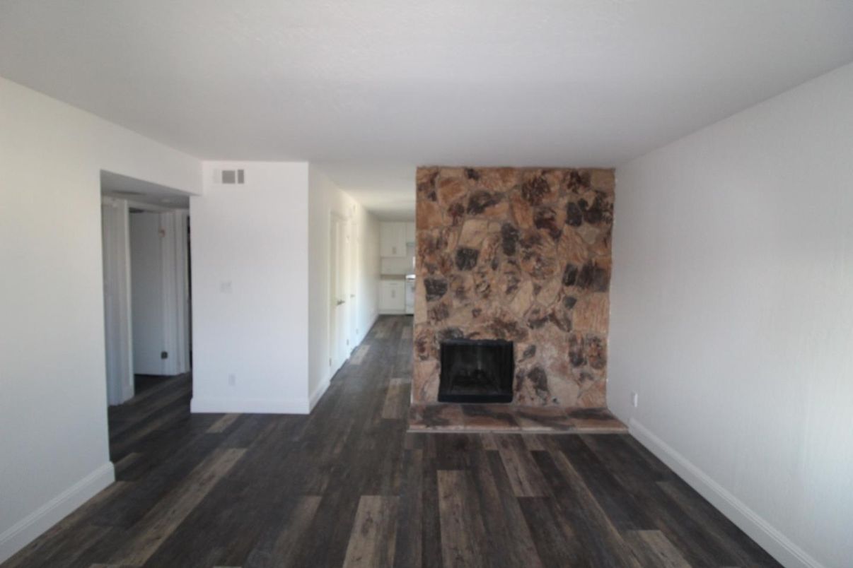 Empty room, Fireplace, Interior, Stone Walls, Wood Texture Flooring