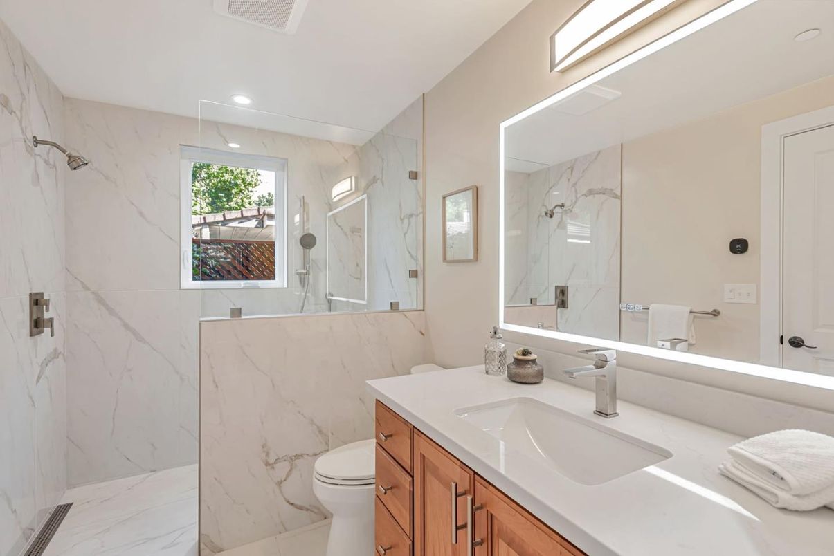 Bathroom, Dual Sink Vanities, Glass Shower, Interior, Marble, Marble Walls, Recessed Lighting