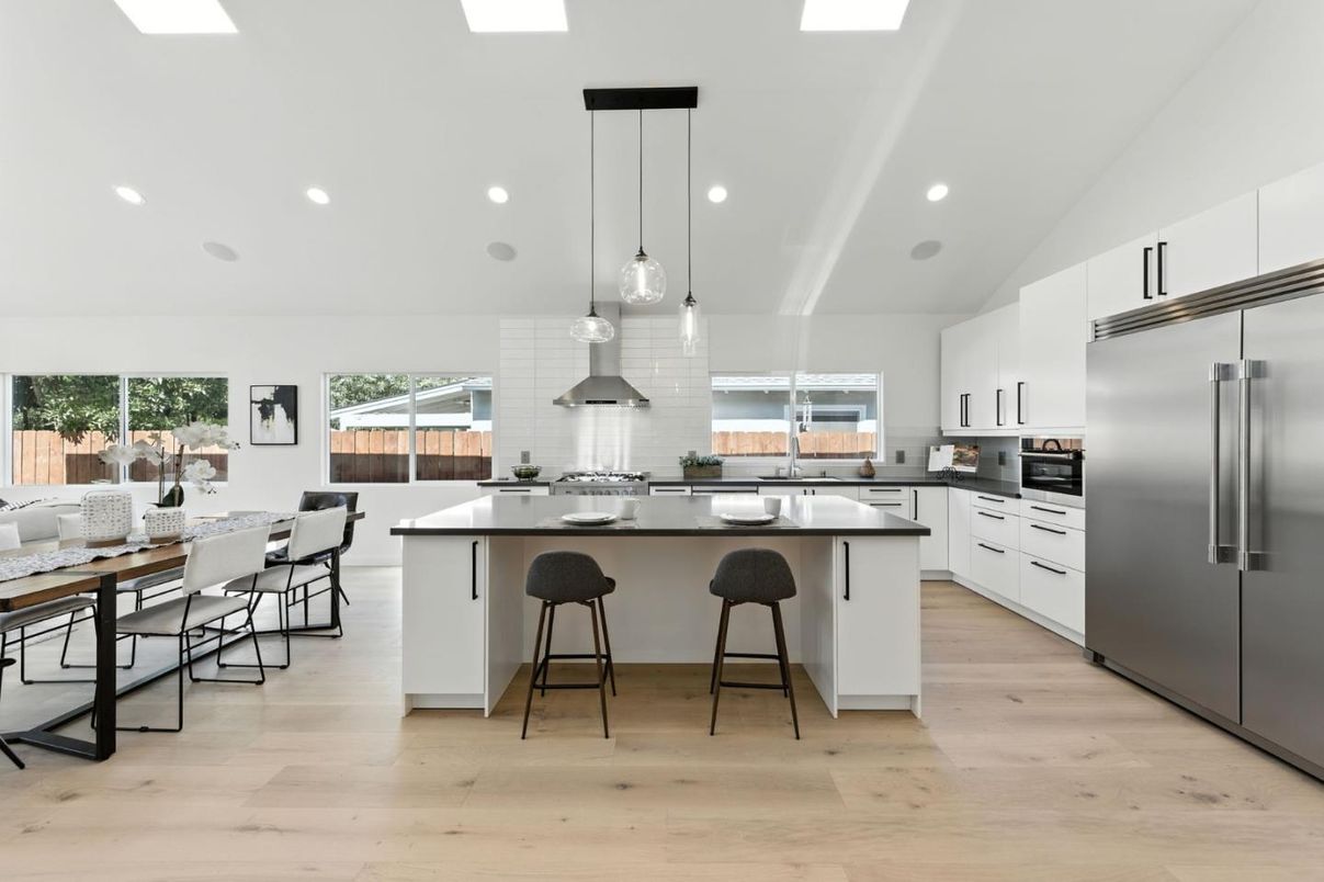 Dining room, Interior, Kitchen, Pendant Lights, Recessed Lighting, Stainless Steel Appliances, Wood Texture Flooring