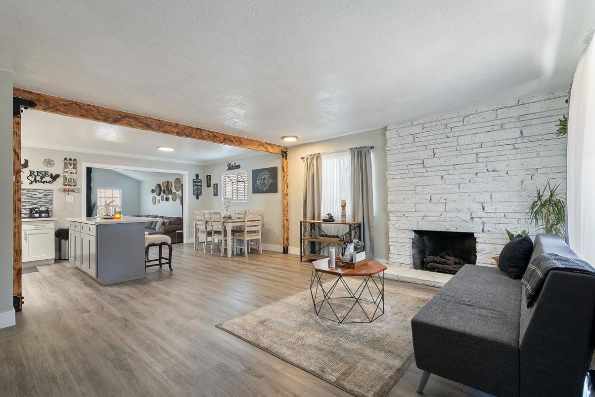 Dining room, Fireplace, Interior, Kitchen, Living room, Recessed Lighting, Stone Walls, Wooden Beams, Wood Texture Flooring