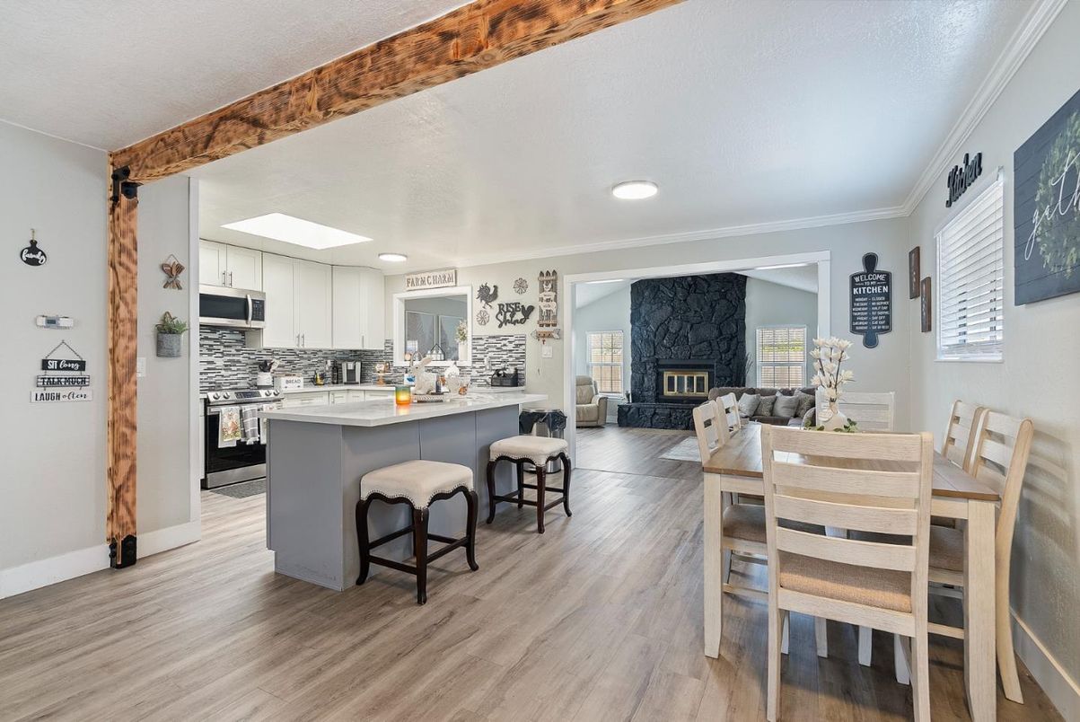 Dining room, Fireplace, Interior, Kitchen, Living room, Recessed Lighting, Wood Texture Flooring