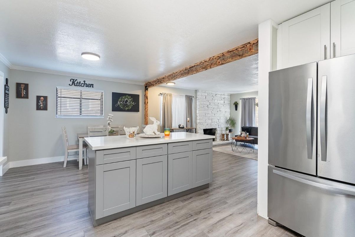 Dining room, Interior, Kitchen, Recessed Lighting, Stainless Steel Appliances, Wood Texture Flooring