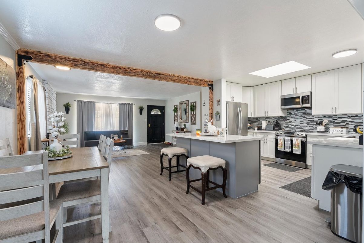 Dining room, Interior, Kitchen, Living room, Recessed Lighting, Stainless Steel Appliances, Wood Texture Flooring