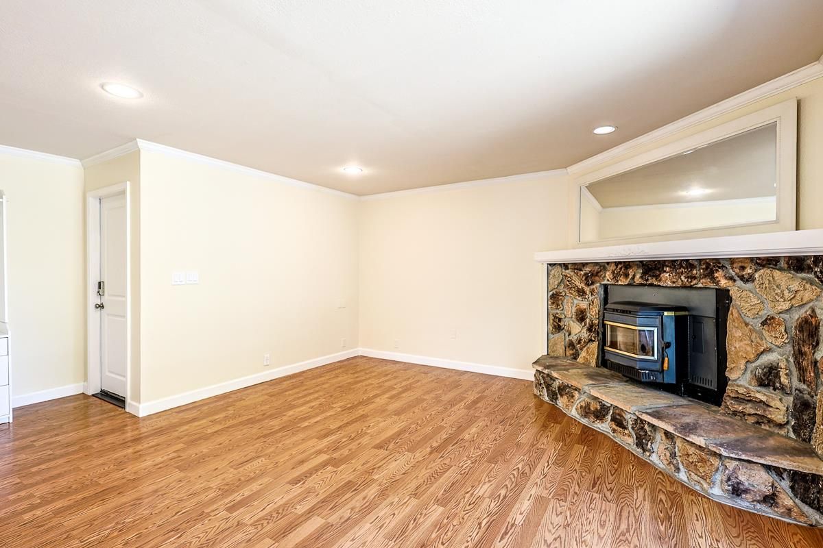 Empty room, Fireplace, Interior, Recessed Lighting, Wood Texture Flooring