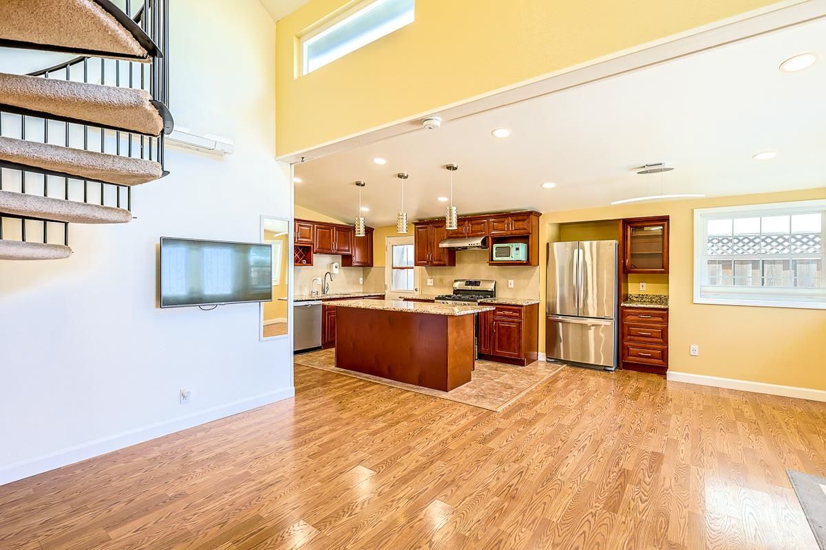 Interior, Kitchen, Pendant Lights, Recessed Lighting, Stainless Steel Appliances, Wood Texture Flooring