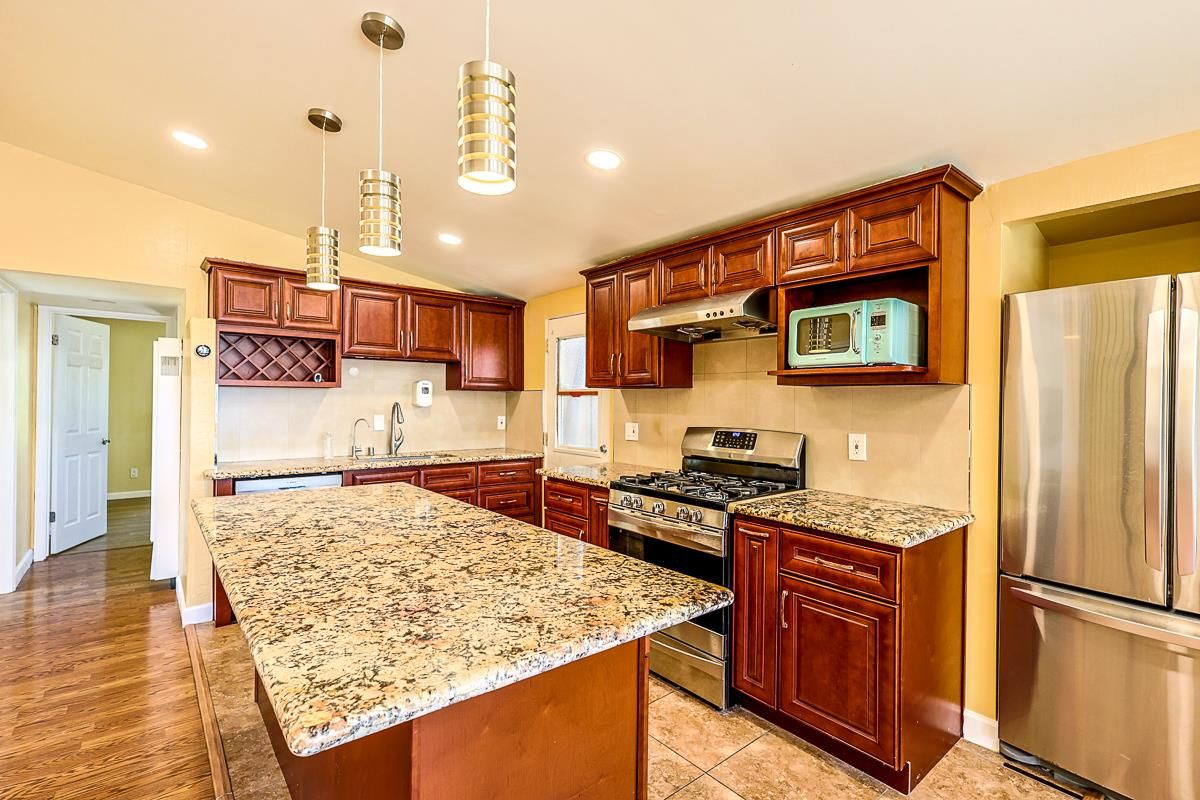 Interior, Kitchen, Pendant Lights, Recessed Lighting, Stainless Steel Appliances, Wood Texture Flooring