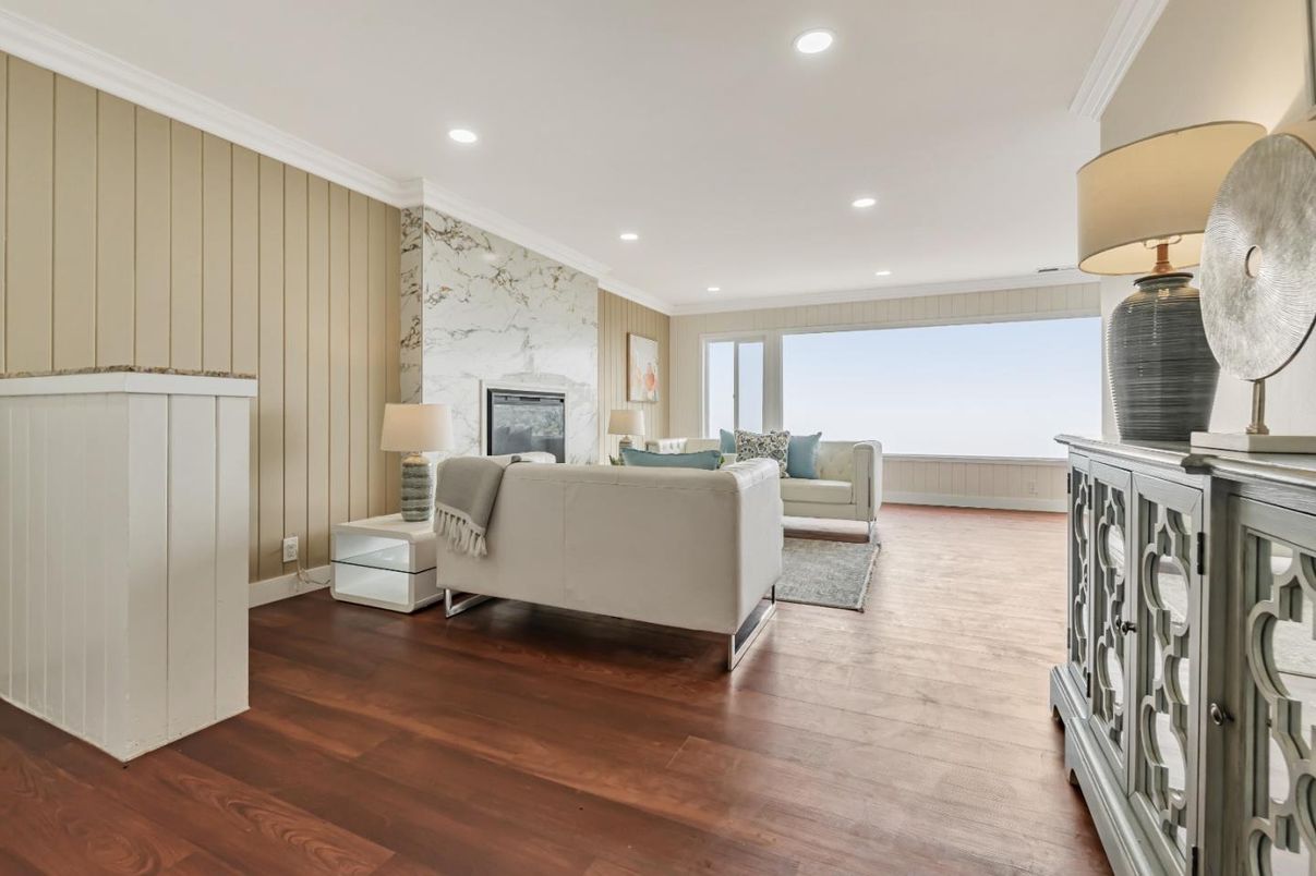 Fireplace, Interior, Living room, Marble Walls, Recessed Lighting, Wood Texture Flooring