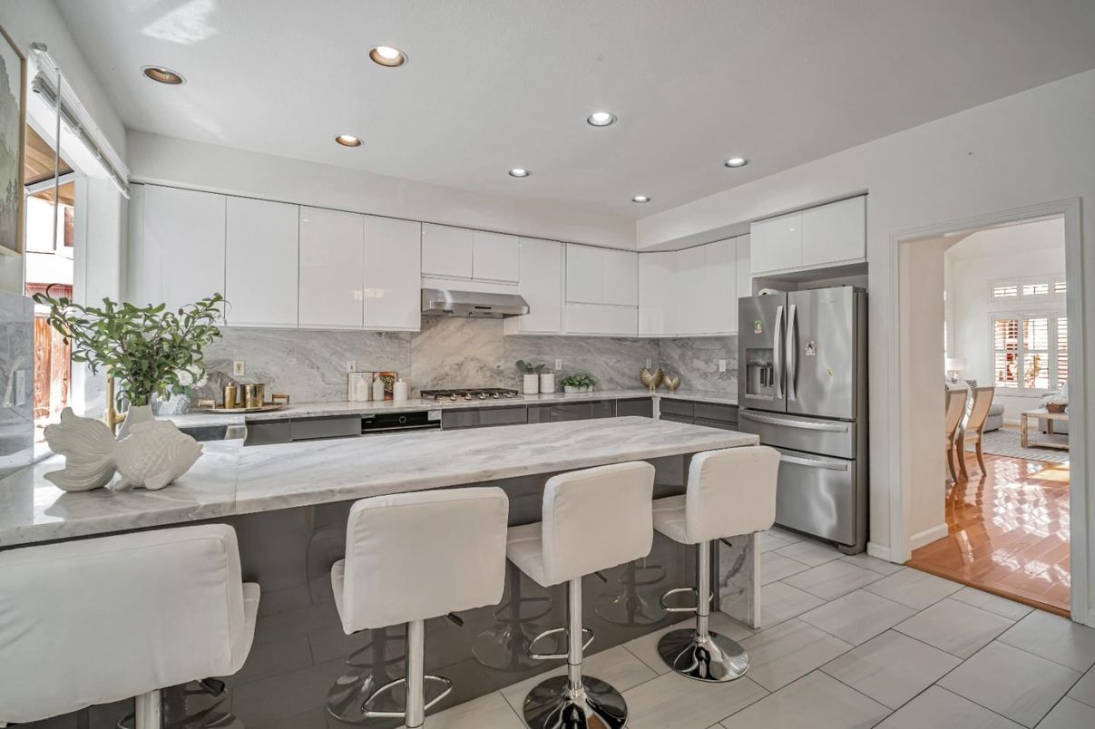 Interior, Kitchen, Marble Walls, Recessed Lighting, Stainless Steel Appliances