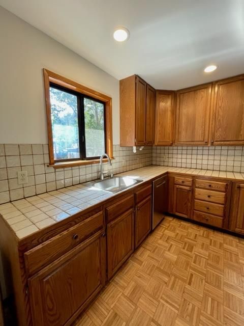 Interior, Kitchen, Recessed Lighting, Tile Countertops, Wood Texture Flooring