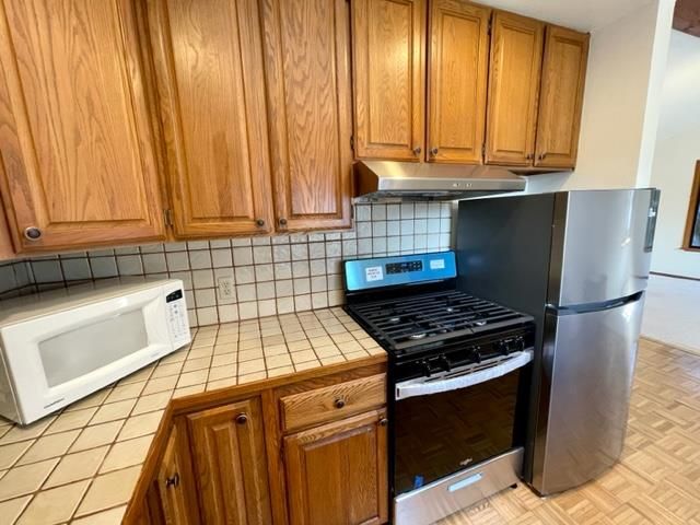 Interior, Kitchen, Tile Countertops, Wood Texture Flooring