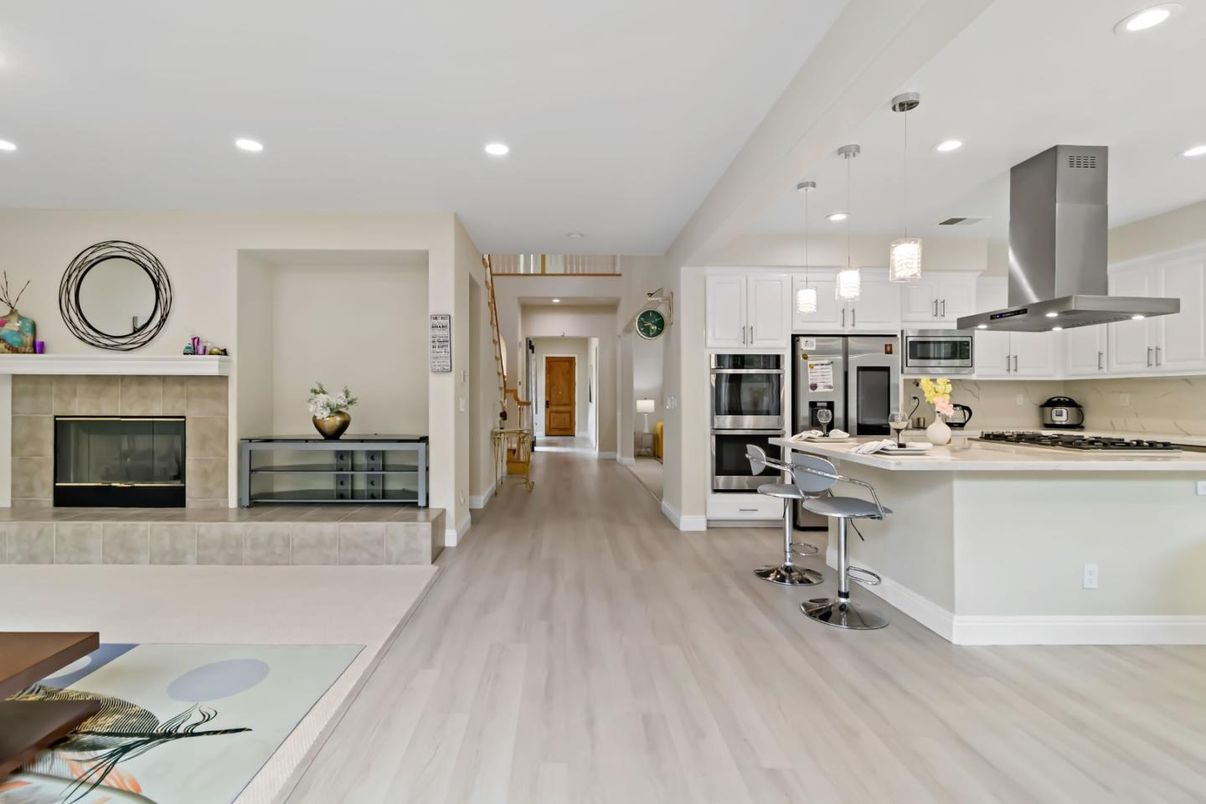 Fireplace, Interior, Kitchen, Pendant Lights, Recessed Lighting, Stainless Steel Appliances, Wood Texture Flooring
