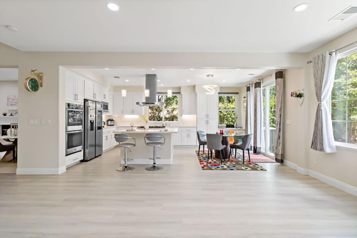 Dining room, Interior, Kitchen, Pendant Lights, Recessed Lighting, Stainless Steel Appliances, Wood Texture Flooring