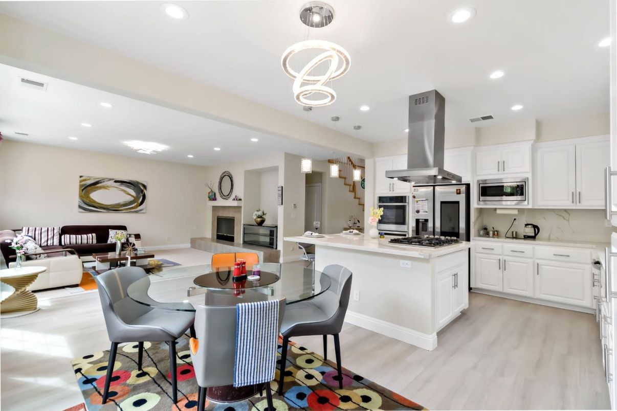 Dining room, Interior, Kitchen, Living room, Pendant Lights, Recessed Lighting, Stainless Steel Appliances, Wood Texture Flooring
