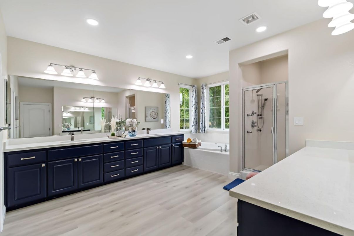 Bathroom, Dual Sink Vanities, Glass Shower, Interior, Recessed Lighting, Wood Texture Flooring