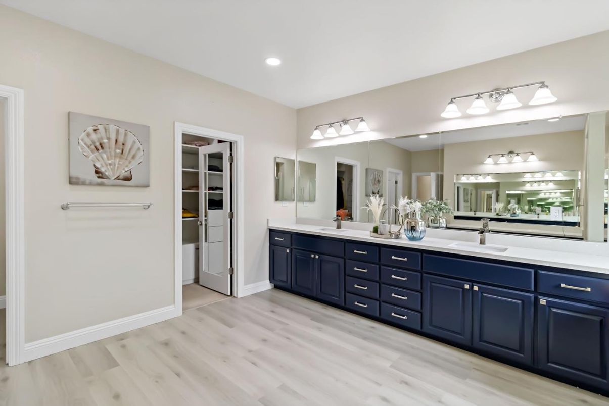 Bathroom, Dual Sink Vanities, Interior, Recessed Lighting, Walk-in Closets, Wood Texture Flooring