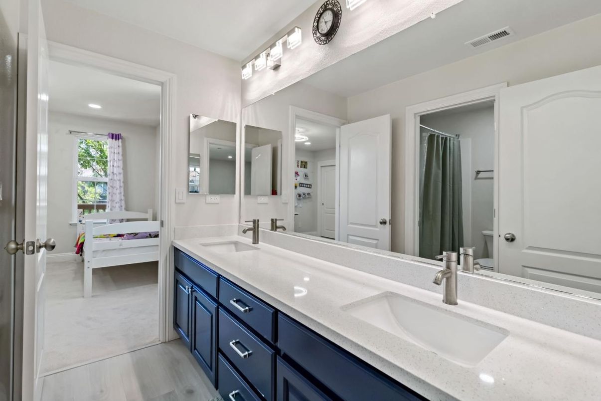 Bathroom, Dual Sink Vanities, Interior, Recessed Lighting, Wood Texture Flooring