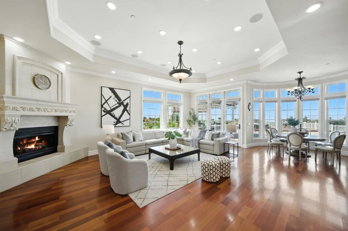 Dining room, Fireplace, Interior, Living room, Pendant Lights, Recessed Lighting, Wood Texture Flooring
