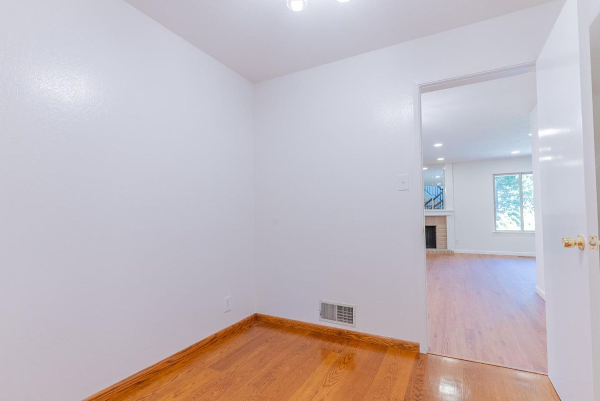 Empty room, Fireplace, Interior, Recessed Lighting, Wood Texture Flooring