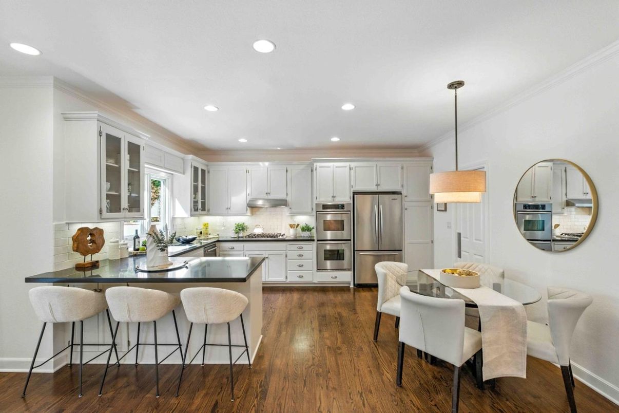 Dining room, Interior, Kitchen, Pendant Lights, Recessed Lighting, Stainless Steel Appliances, Wood Texture Flooring
