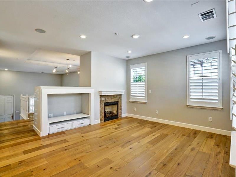 Empty room, Fireplace, Interior, Pendant Lights, Recessed Lighting, Wood Texture Flooring