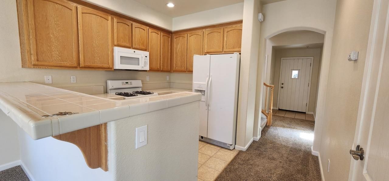 Interior, Kitchen, Recessed Lighting, Tile Countertops
