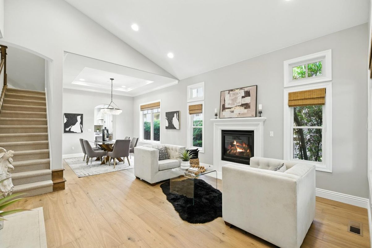 Chandelier, Dining room, Fireplace, Interior, Living room, Pendant Lights, Recessed Lighting, Wood Texture Flooring