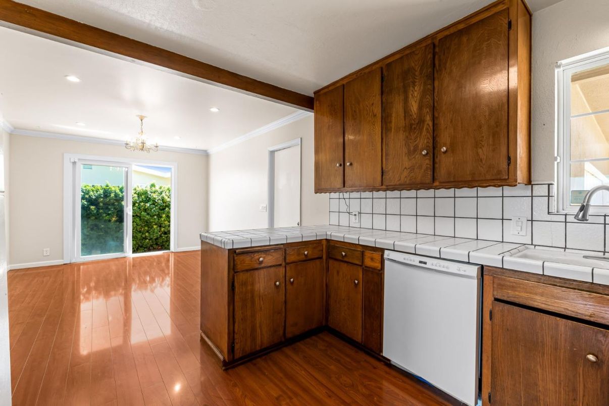 Chandelier, Interior, Kitchen, Recessed Lighting, Tile Countertops, Wood Texture Flooring