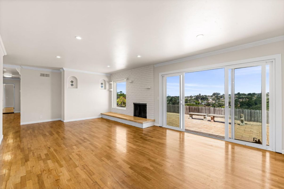 Empty room, Fireplace, Interior, Recessed Lighting, Stone Walls, Wood Texture Flooring
