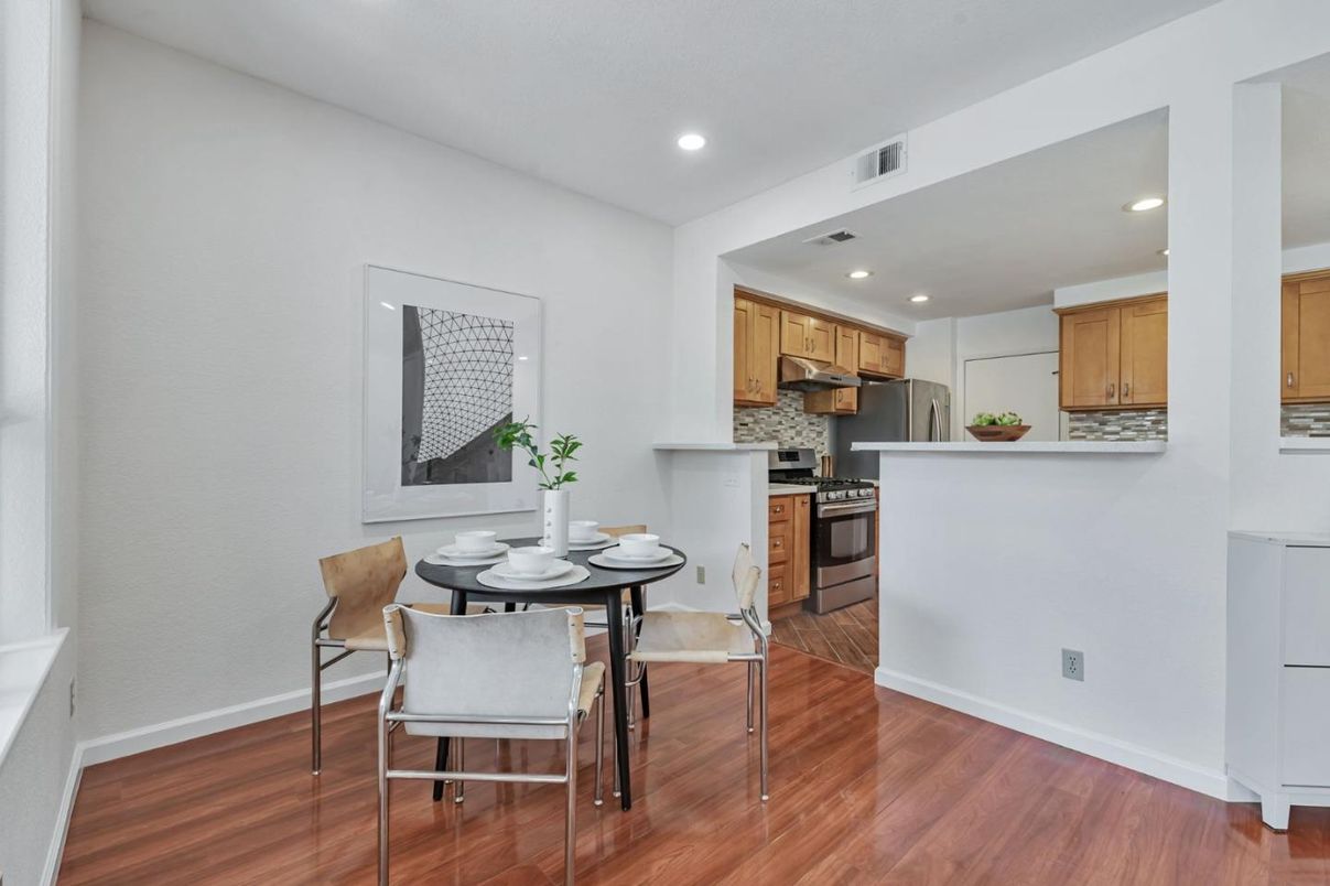 Dining room, Interior, Kitchen, Recessed Lighting, Stainless Steel Appliances, Wood Texture Flooring