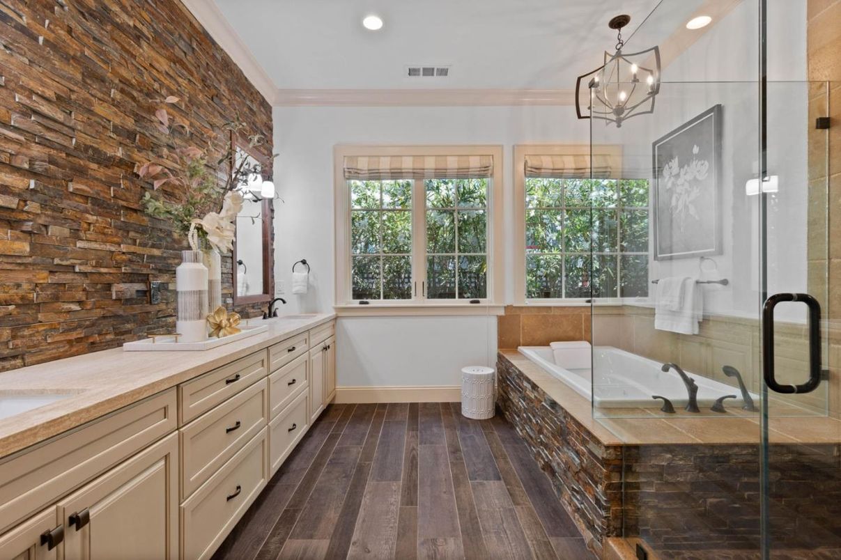 Bathroom, Dual Sink Vanities, Glass Shower, Interior, Pendant Lights, Recessed Lighting, Wood Texture Flooring
