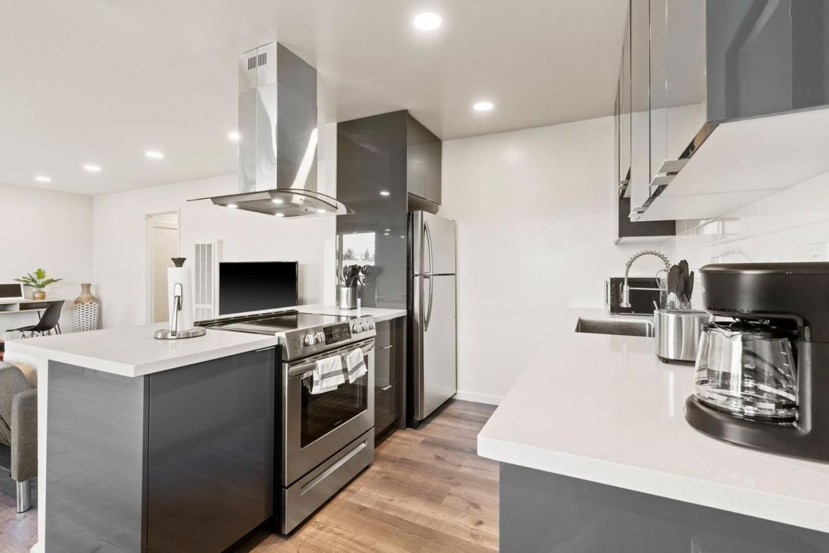 Interior, Kitchen, Recessed Lighting, Stainless Steel Appliances, Wood Texture Flooring