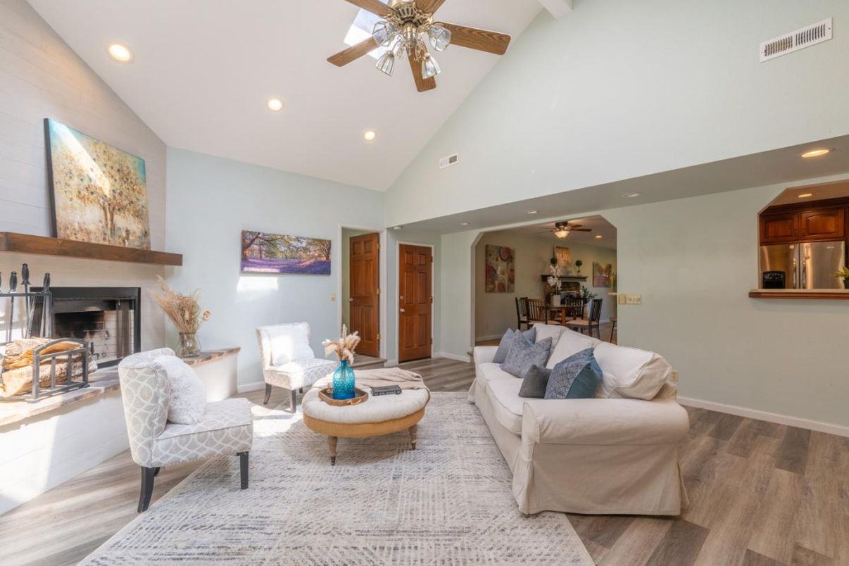 Dining room, Fireplace, Interior, Living room, Recessed Lighting, Wood Texture Flooring