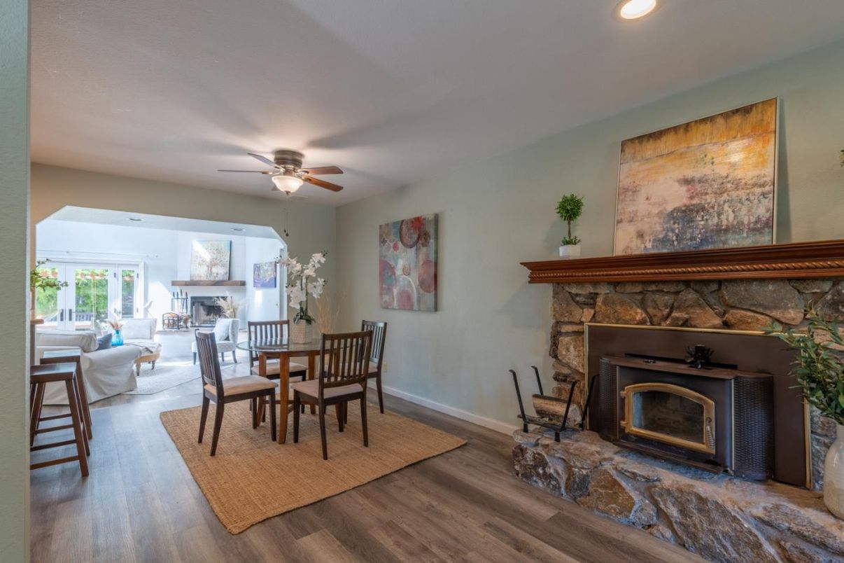 Dining room, Fireplace, Interior, Living room, Recessed Lighting, Wood Texture Flooring