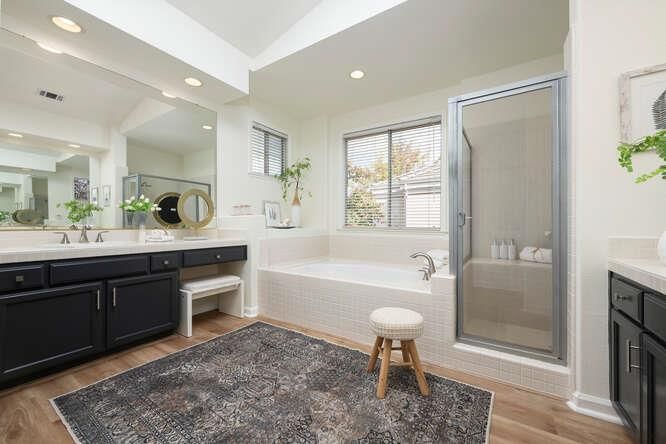 Bathroom, Dual Sink Vanities, Glass Shower, Interior, Recessed Lighting, Wood Texture Flooring