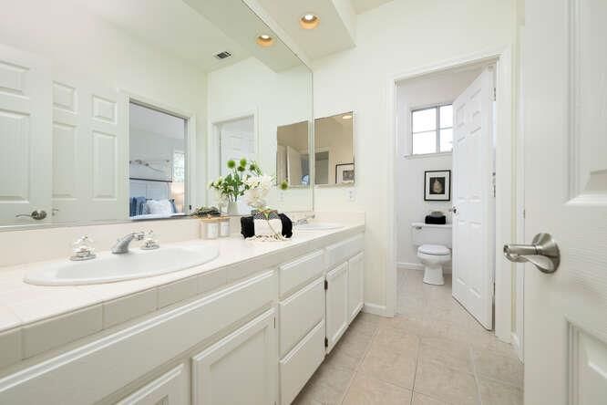 Bathroom, Dual Sink Vanities, Interior, Recessed Lighting, Tile Countertops