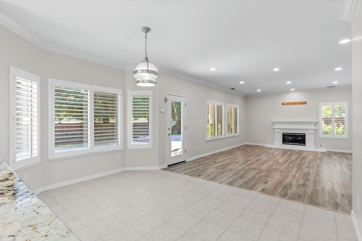Empty room, Fireplace, Interior, Pendant Lights, Recessed Lighting, Wood Texture Flooring